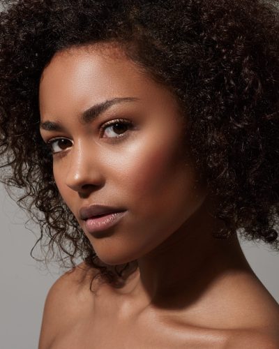 Flawless beauty. A beautiful young woman looking at the camera